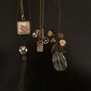 Three long necklaces.